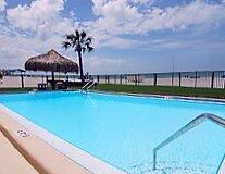 a pool next to a body of water